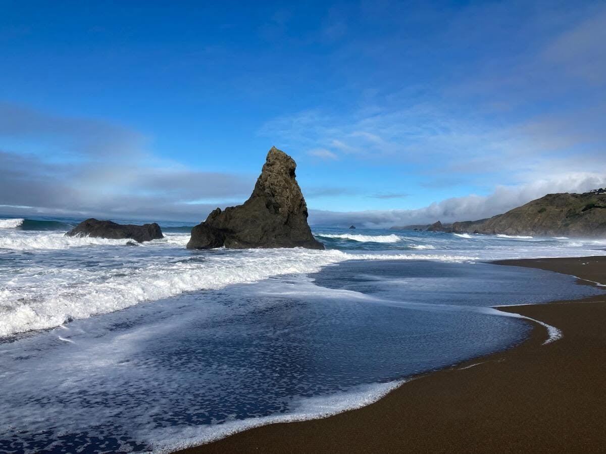 Sea stack and surf at private Irish Beach